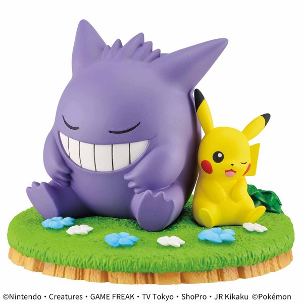 Pokemon Gengar and Pikachu figurine display