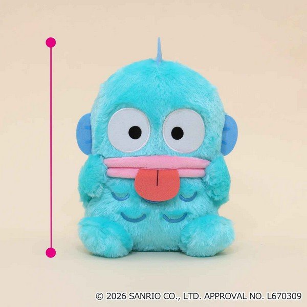 Hangyodon plushie making a playful "bleh" face